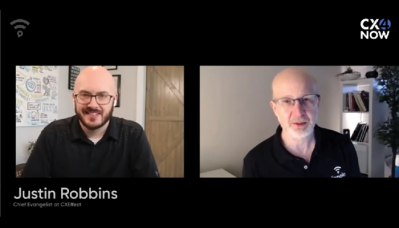 A video screencap of Justin Robbins talking to Shai Berger in a side-by-side video chat